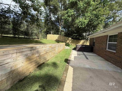 MOTIVATED SELLER! Welcome to this beautifully remodeled home on Lake Forest Yacht and Country Club in Alabama - for sale on GolfHomes.com, golf home, golf lot
