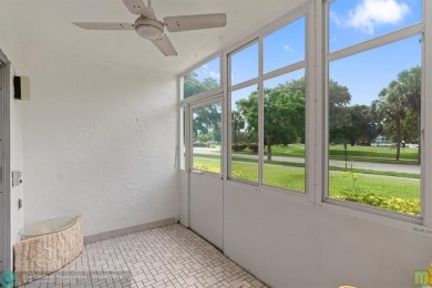 Resort-style living can be yours in the beautiful community of on Wynmoor Golf Course in Florida - for sale on GolfHomes.com, golf home, golf lot