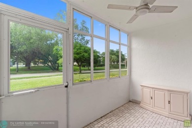 Resort-style living can be yours in the beautiful community of on Wynmoor Golf Course in Florida - for sale on GolfHomes.com, golf home, golf lot