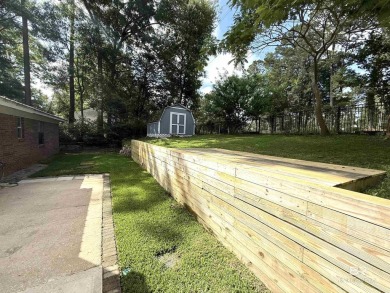 MOTIVATED SELLER! Welcome to this beautifully remodeled home on Lake Forest Yacht and Country Club in Alabama - for sale on GolfHomes.com, golf home, golf lot