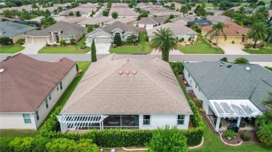 Welcome home to this bond paid, customized Lilac Designer, golf on Yankee Clipper Executive Golf Course in Florida - for sale on GolfHomes.com, golf home, golf lot