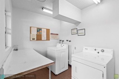 Resort-style living can be yours in the beautiful community of on Wynmoor Golf Course in Florida - for sale on GolfHomes.com, golf home, golf lot