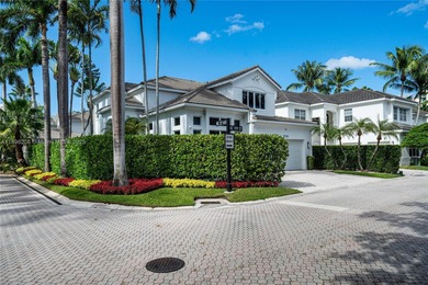 Rarely available two-story pool home with garage in gated on Turnberry Isle Resort and Club in Florida - for sale on GolfHomes.com, golf home, golf lot
