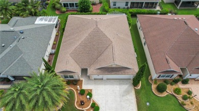 Welcome home to this bond paid, customized Lilac Designer, golf on Yankee Clipper Executive Golf Course in Florida - for sale on GolfHomes.com, golf home, golf lot