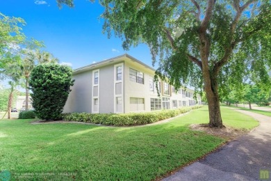 Resort-style living can be yours in the beautiful community of on Wynmoor Golf Course in Florida - for sale on GolfHomes.com, golf home, golf lot