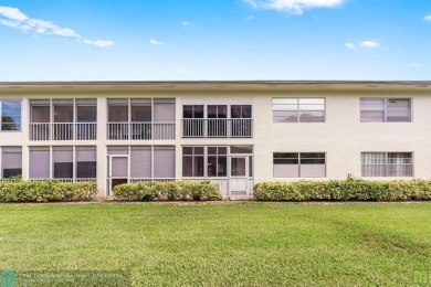 Resort-style living can be yours in the beautiful community of on Wynmoor Golf Course in Florida - for sale on GolfHomes.com, golf home, golf lot