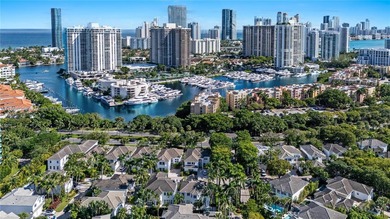 Rarely available two-story pool home with garage in gated on Turnberry Isle Resort and Club in Florida - for sale on GolfHomes.com, golf home, golf lot