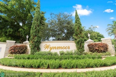 Resort-style living can be yours in the beautiful community of on Wynmoor Golf Course in Florida - for sale on GolfHomes.com, golf home, golf lot