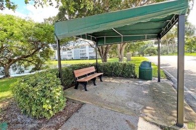 Resort-style living can be yours in the beautiful community of on Wynmoor Golf Course in Florida - for sale on GolfHomes.com, golf home, golf lot