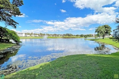 Resort-style living can be yours in the beautiful community of on Wynmoor Golf Course in Florida - for sale on GolfHomes.com, golf home, golf lot