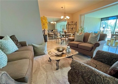 Beautifully turnkey furnished, this spacious 2-bedroom, 2-bath on Eagle Creek Golf and Country Club in Florida - for sale on GolfHomes.com, golf home, golf lot