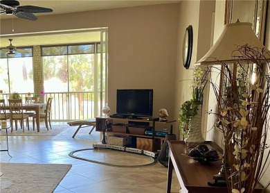 Beautifully turnkey furnished, this spacious 2-bedroom, 2-bath on Eagle Creek Golf and Country Club in Florida - for sale on GolfHomes.com, golf home, golf lot