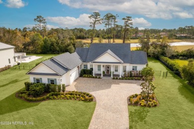 Tucked away on a quiet cul-de-sac street, this stunning on The Palencia Club in Florida - for sale on GolfHomes.com, golf home, golf lot