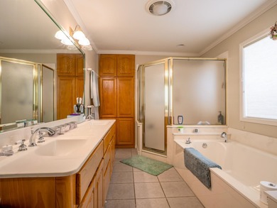 This three-bedroom, two-bathroom home is nestled on a pecan on Hidden Falls Golf Club in Texas - for sale on GolfHomes.com, golf home, golf lot