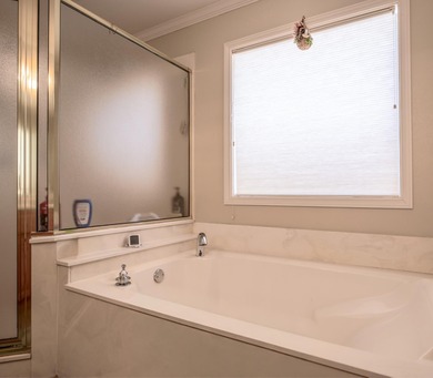 This three-bedroom, two-bathroom home is nestled on a pecan on Hidden Falls Golf Club in Texas - for sale on GolfHomes.com, golf home, golf lot