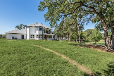 Nestled majestically on the coveted shores of private and secure on Lake Kiowa Golf Course in Texas - for sale on GolfHomes.com, golf home, golf lot