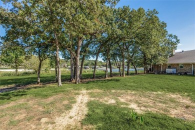 Nestled majestically on the coveted shores of private and secure on Lake Kiowa Golf Course in Texas - for sale on GolfHomes.com, golf home, golf lot