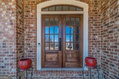 Timeless elegance meets modern luxury in this exceptional home on The Georgia Club in Georgia - for sale on GolfHomes.com, golf home, golf lot