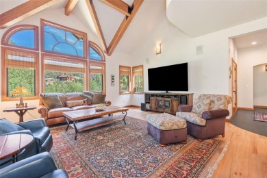This stunning home is tucked into a quiet cul-de-sac in the on Rollingstone Ranch Golf Club in Colorado - for sale on GolfHomes.com, golf home, golf lot