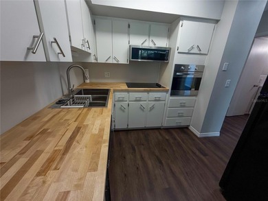 Cozy, updated, and ready for you! This inviting 1 bedroom, 1 on On Top Of The World Golf Course in Florida - for sale on GolfHomes.com, golf home, golf lot