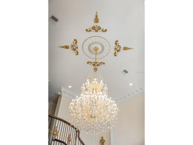 Renovated and remodeled in 2018, this remarkable estate embodies on The Golden Bear Club At Keenes Pointe in Florida - for sale on GolfHomes.com, golf home, golf lot