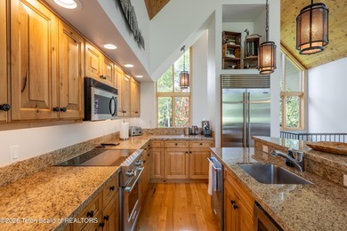 Bordering the 11th fairway of the prestigious Teton Pines golf on Teton Pines Golf Club in Wyoming - for sale on GolfHomes.com, golf home, golf lot