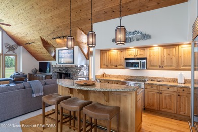 Bordering the 11th fairway of the prestigious Teton Pines golf on Teton Pines Golf Club in Wyoming - for sale on GolfHomes.com, golf home, golf lot