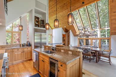 Bordering the 11th fairway of the prestigious Teton Pines golf on Teton Pines Golf Club in Wyoming - for sale on GolfHomes.com, golf home, golf lot