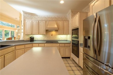 Beautiful stucco home in The Landings! Featuring 4 bedrooms on The Landings Club - Oakridge in Georgia - for sale on GolfHomes.com, golf home, golf lot