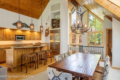 Bordering the 11th fairway of the prestigious Teton Pines golf on Teton Pines Golf Club in Wyoming - for sale on GolfHomes.com, golf home, golf lot