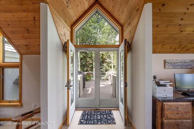 Bordering the 11th fairway of the prestigious Teton Pines golf on Teton Pines Golf Club in Wyoming - for sale on GolfHomes.com, golf home, golf lot