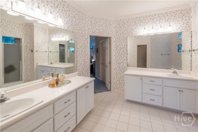 Beautiful stucco home in The Landings! Featuring 4 bedrooms on The Landings Club - Oakridge in Georgia - for sale on GolfHomes.com, golf home, golf lot