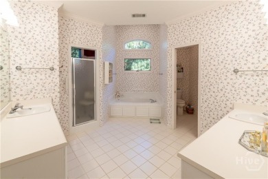 Beautiful stucco home in The Landings! Featuring 4 bedrooms on The Landings Club - Oakridge in Georgia - for sale on GolfHomes.com, golf home, golf lot