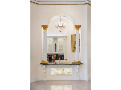 Renovated and remodeled in 2018, this remarkable estate embodies on The Golden Bear Club At Keenes Pointe in Florida - for sale on GolfHomes.com, golf home, golf lot