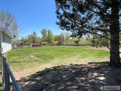 Tastefully updated move in ready 3 bedroom home on a 1 acre lot on Jefferson Hills Golf Course in Idaho - for sale on GolfHomes.com, golf home, golf lot
