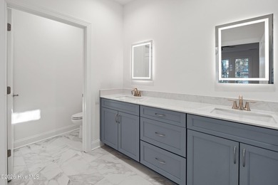 Another gorgeous custom-built home, to-be-built by Greenwatch on Lockwood Folly Country Club in North Carolina - for sale on GolfHomes.com, golf home, golf lot