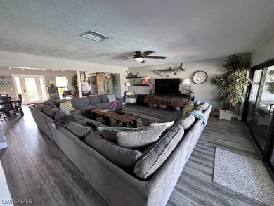 This beautiful Marco Island home was featured on HGTV's Vacation on Island Country Club in Florida - for sale on GolfHomes.com, golf home, golf lot