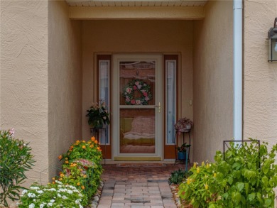 Pride of ownership is evident in this ready-to-move-in on Lake Ashton Golf Club in Florida - for sale on GolfHomes.com, golf home, golf lot