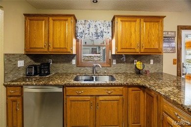 Imagine unlocking the door to your dream home in the enchanting on Bent Creek Golf Course in Missouri - for sale on GolfHomes.com, golf home, golf lot