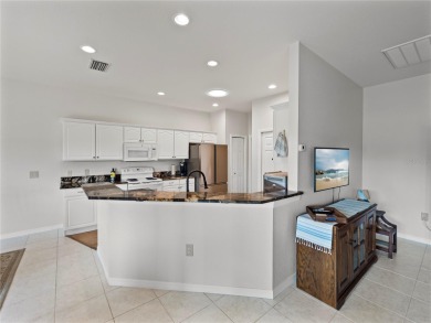 Pride of ownership is evident in this ready-to-move-in on Lake Ashton Golf Club in Florida - for sale on GolfHomes.com, golf home, golf lot