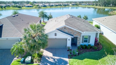 NEW YEAR - NEW HOME! In this Solivita WATERFRONT Opportunity! on Stonegate Golf Club in Florida - for sale on GolfHomes.com, golf home, golf lot