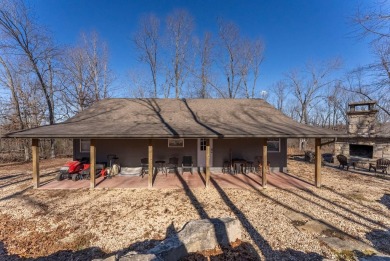 Located just 1.8 miles from the pristine waters of Bull Shoals on Lost Woods Golf Course in Missouri - for sale on GolfHomes.com, golf home, golf lot