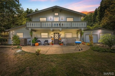 Unique and full of charm, this home sits on four lots totaling 2 on Terre Du Lac Golf and Country Club in Missouri - for sale on GolfHomes.com, golf home, golf lot