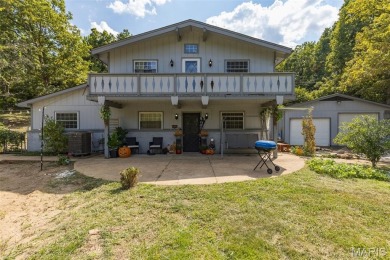 Unique and full of charm, this home sits on four lots totaling 2 on Terre Du Lac Golf and Country Club in Missouri - for sale on GolfHomes.com, golf home, golf lot