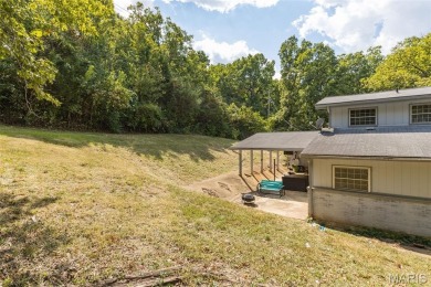 Unique and full of charm, this home sits on four lots totaling 2 on Terre Du Lac Golf and Country Club in Missouri - for sale on GolfHomes.com, golf home, golf lot