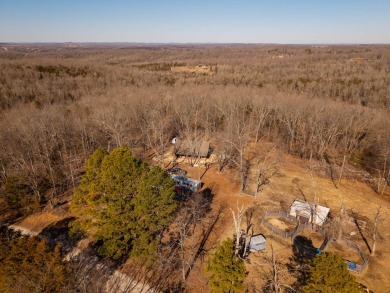 Located just 1.8 miles from the pristine waters of Bull Shoals on Lost Woods Golf Course in Missouri - for sale on GolfHomes.com, golf home, golf lot