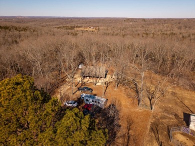 Located just 1.8 miles from the pristine waters of Bull Shoals on Lost Woods Golf Course in Missouri - for sale on GolfHomes.com, golf home, golf lot