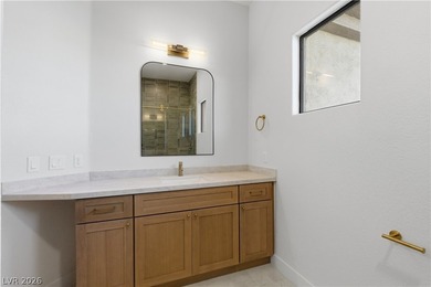 Nestled in guard-gated Eagle Rock community, this stunning home on TPC Las Vegas in Nevada - for sale on GolfHomes.com, golf home, golf lot