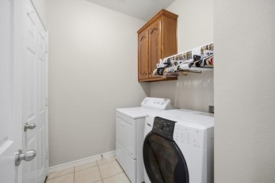 Welcome to this beautifully updated 3-bedroom, 2-bath home with on Woodbridge Golf Club in Texas - for sale on GolfHomes.com, golf home, golf lot