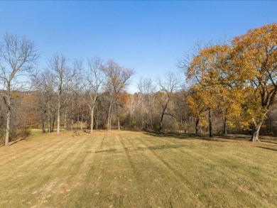 Tucked at the end of a long private drive sits this immaculately on Eagle Ridge Inn and Resort in Illinois - for sale on GolfHomes.com, golf home, golf lot